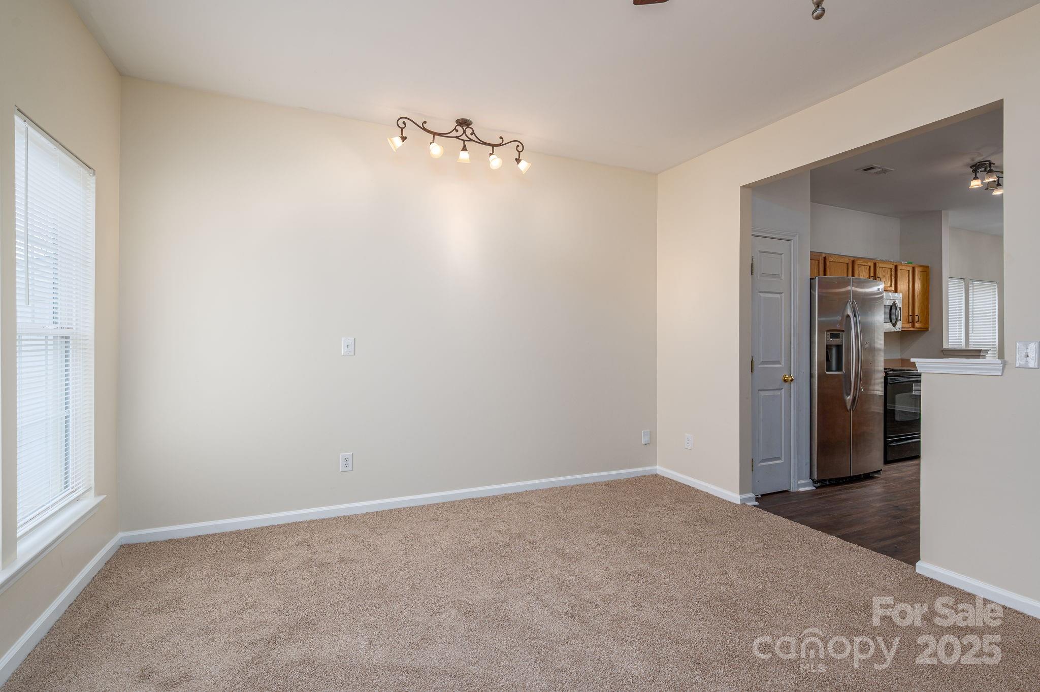 7937 Mariners Pointe Circle Denver, NC 28037 - Photo 11 of 38 a view of an empty room