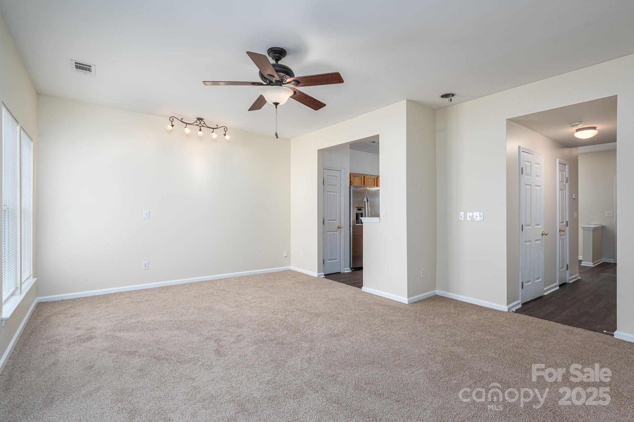 7937 Mariners Pointe Circle Denver, NC 28037 - Photo 13 of 38 a view of a big room with closet and windows