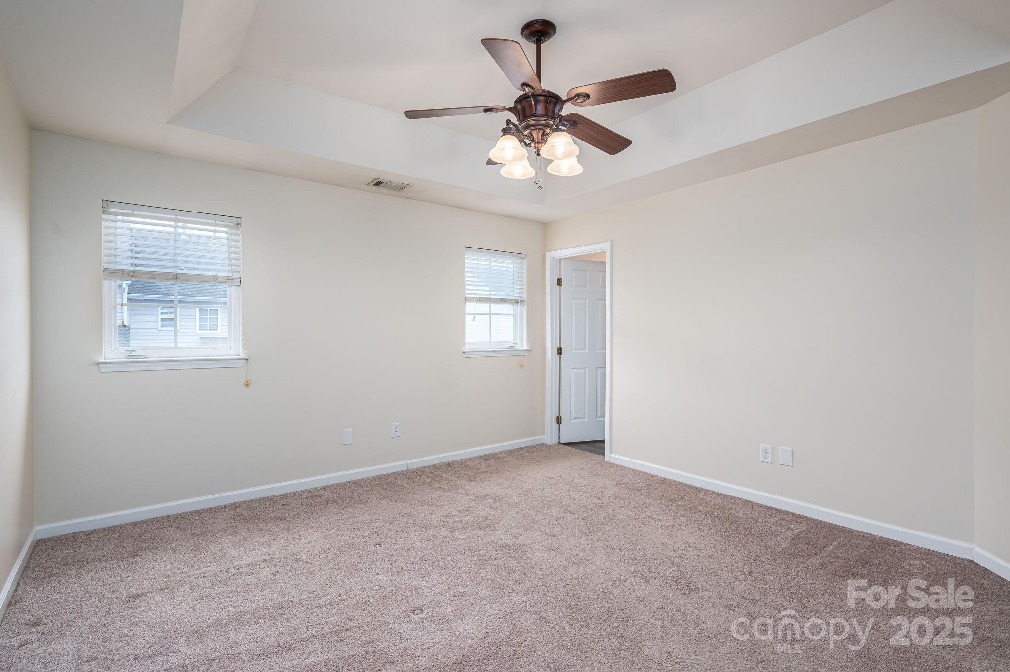 7937 Mariners Pointe Circle Denver, NC 28037 - Photo 19 of 38 a view of an empty room with a window