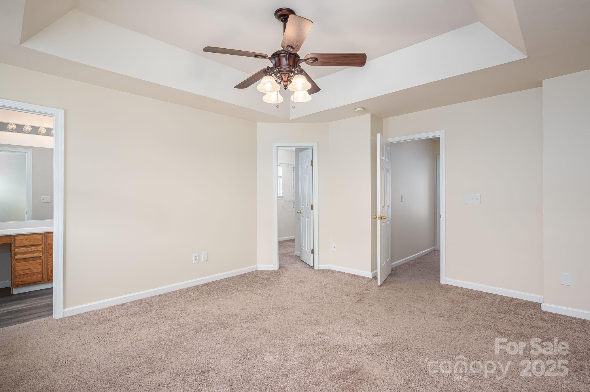 7937 Mariners Pointe Circle Denver, NC 28037 - Photo 20 of 38 a view of an empty room and chandelier fan