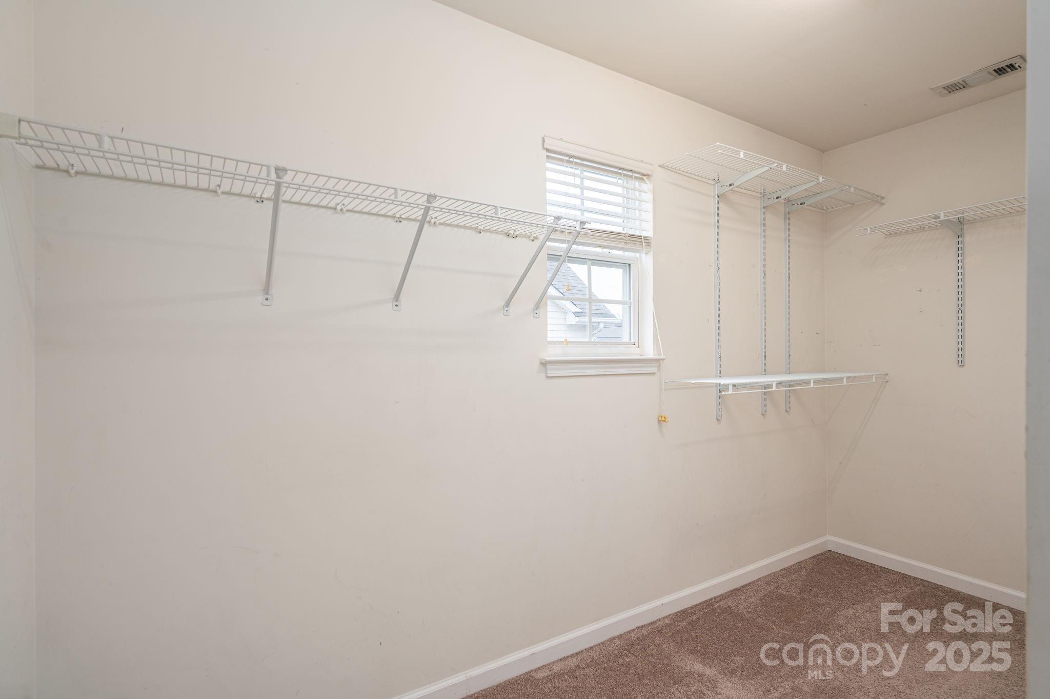 7937 Mariners Pointe Circle Denver, NC 28037 - Photo 22 of 38 a view of a room that has a window in it