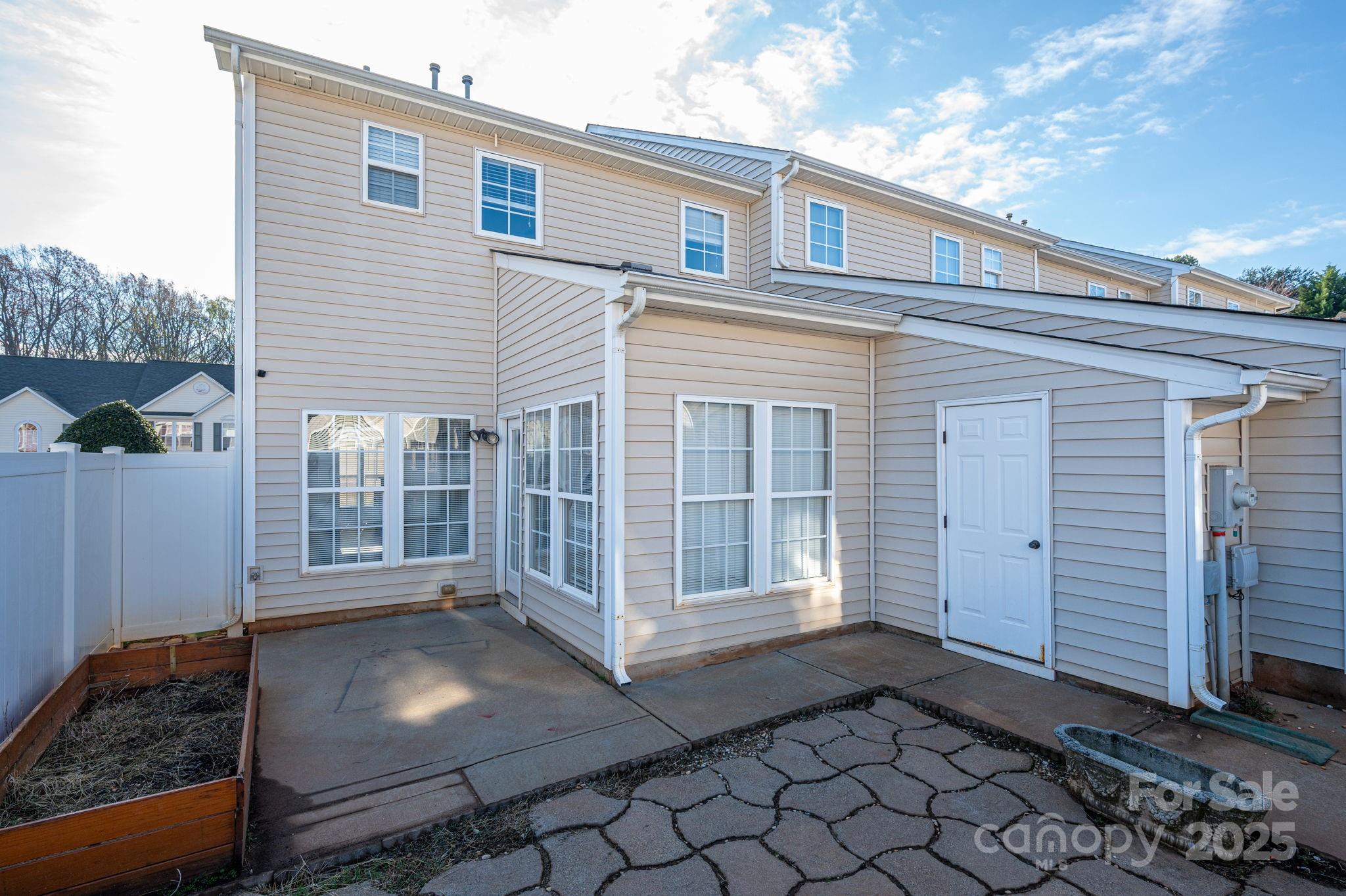 7937 Mariners Pointe Circle Denver, NC 28037 - Photo 28 of 38 a front view of a house with a garage