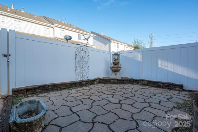 a view of a backyard of a house with stairs
