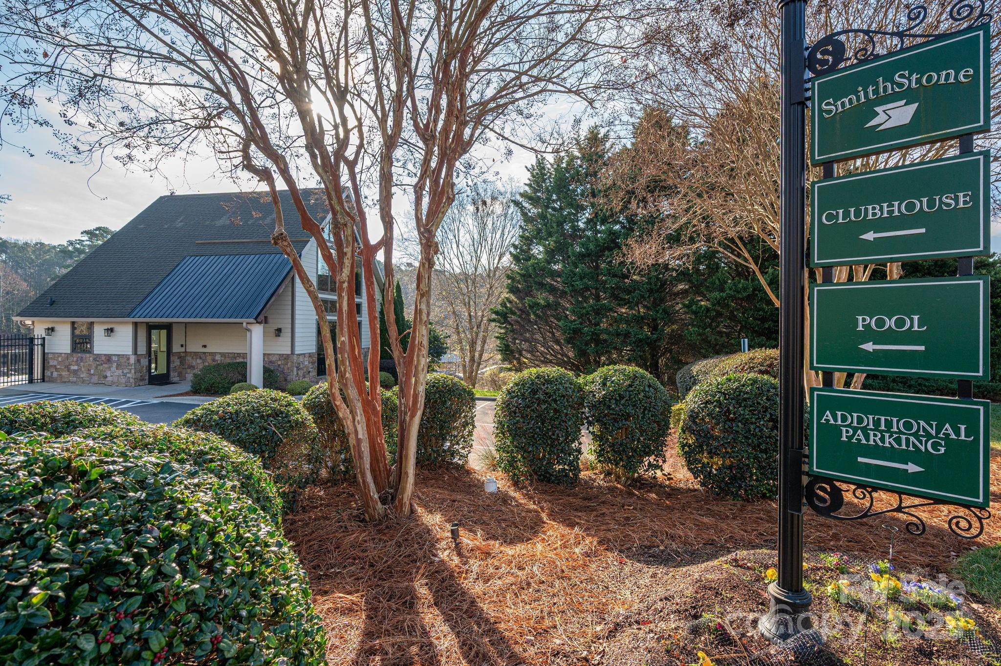 7937 Mariners Pointe Circle Denver, NC 28037 - Photo 34 of 38 a front view of a house with garden