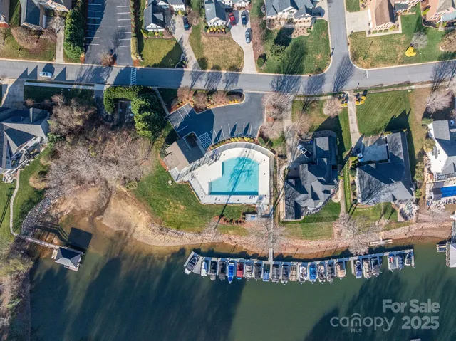 an aerial view of a house with outdoor space