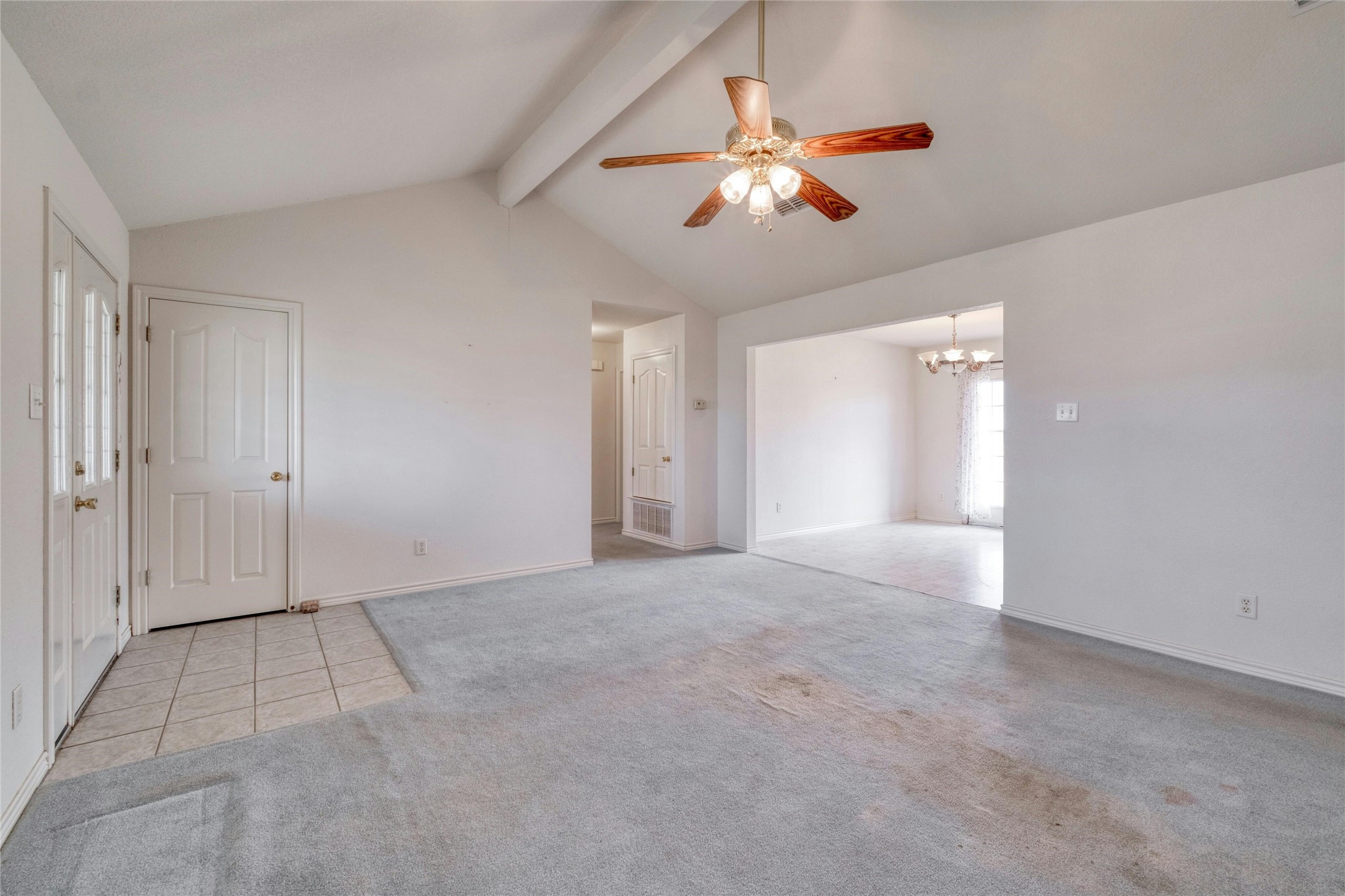 615 County Road 357 Granger, TX 76530 - Photo 11 of 30 a view of an empty room with a chandelier fan