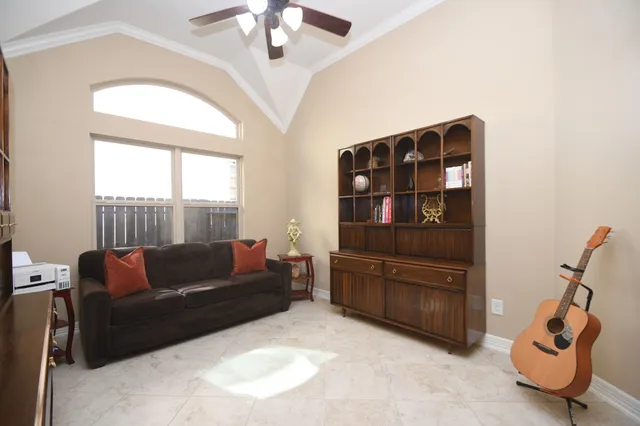 a spacious bathroom with a granite countertop sink a mirror a and a