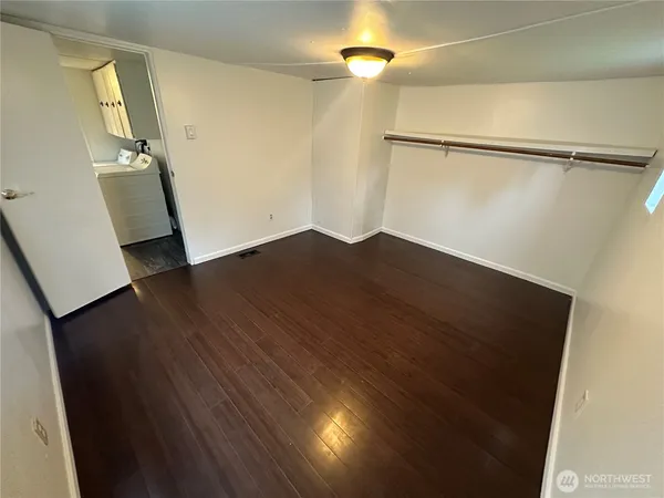 a room with furniture and a staircase