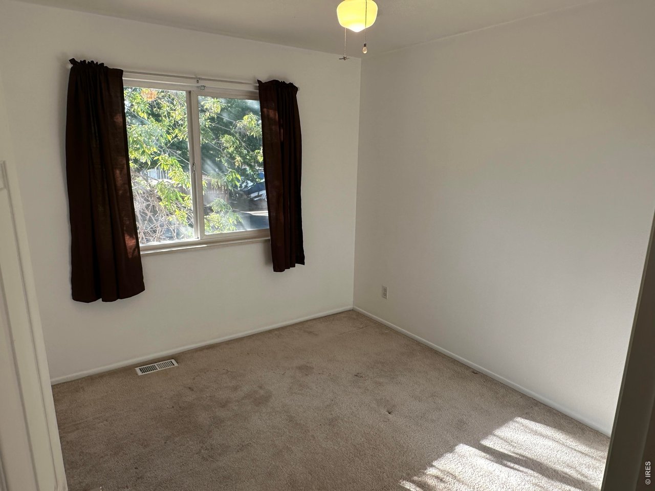 268 Fifth Street Firestone, CO 80520 - Photo 17 of 25 a view of a window in an empty room
