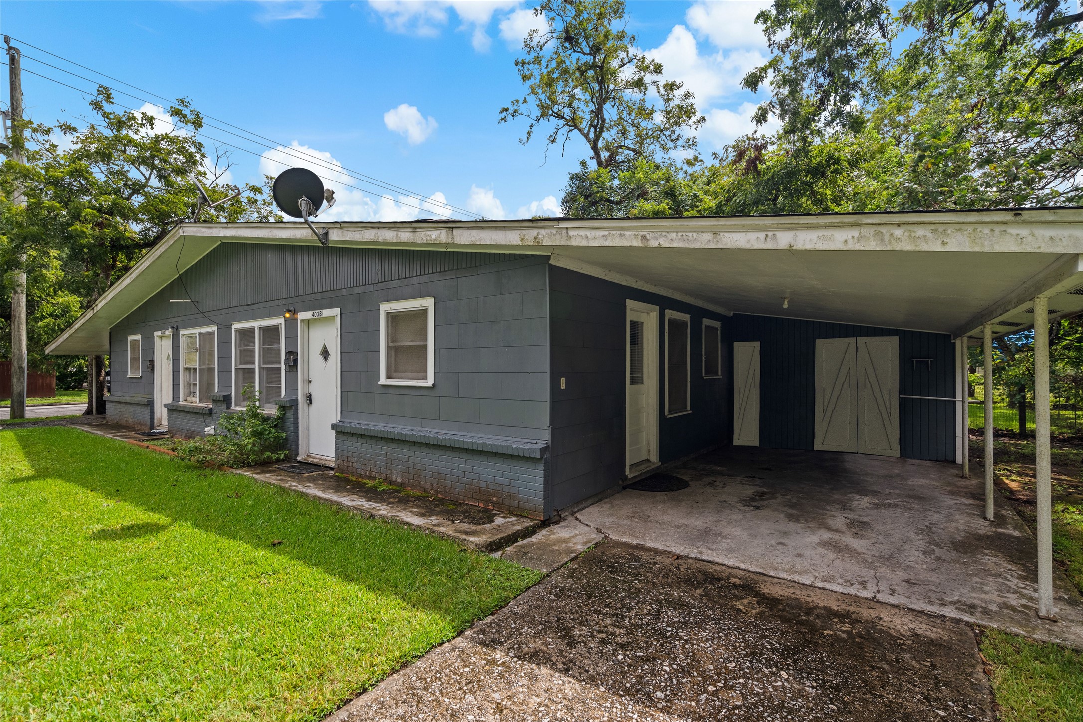 411 Forrest Street Baytown, TX 77520 - Photo 9 of 9 a view of a house with a sink and yard