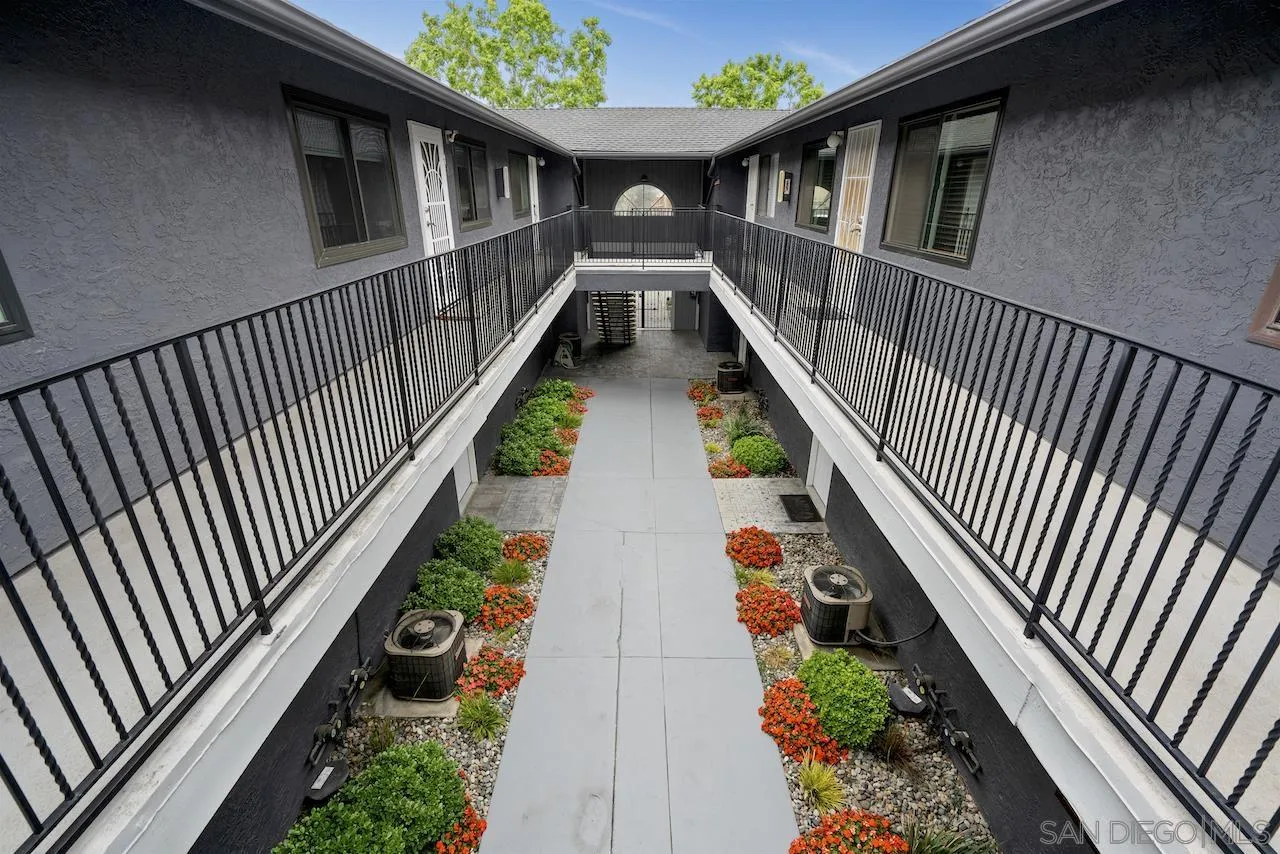 4375 37th Street, Unit 8 San Diego, CA 92105 - Photo 15 of 17 a view of balcony with wooden floor and stairs
