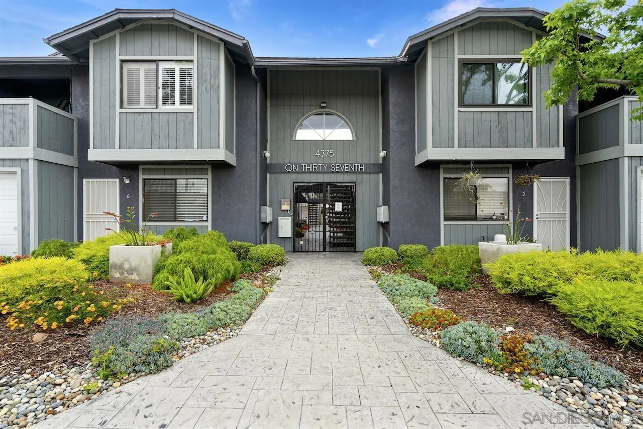 4375 37th Street, Unit 8 San Diego, CA 92105 - Photo 16 of 17 a front view of a house with garden