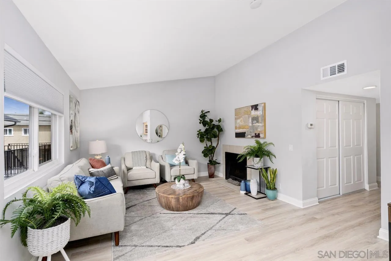4375 37th Street, Unit 8 San Diego, CA 92105 - Photo 2 of 17 a living room with furniture potted plant and a window