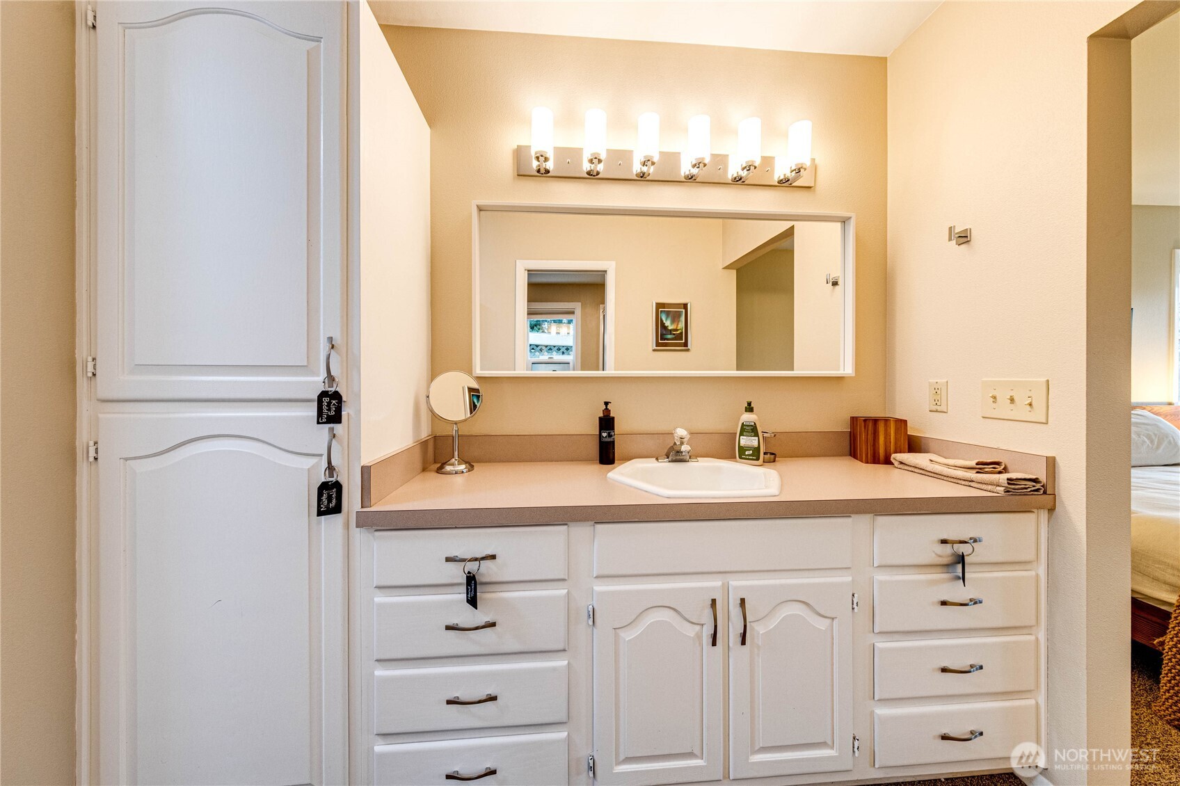1922 West 7th Street Port Angeles, WA 98363 - Photo 22 of 40 a bathroom with a sink vanity and a mirror