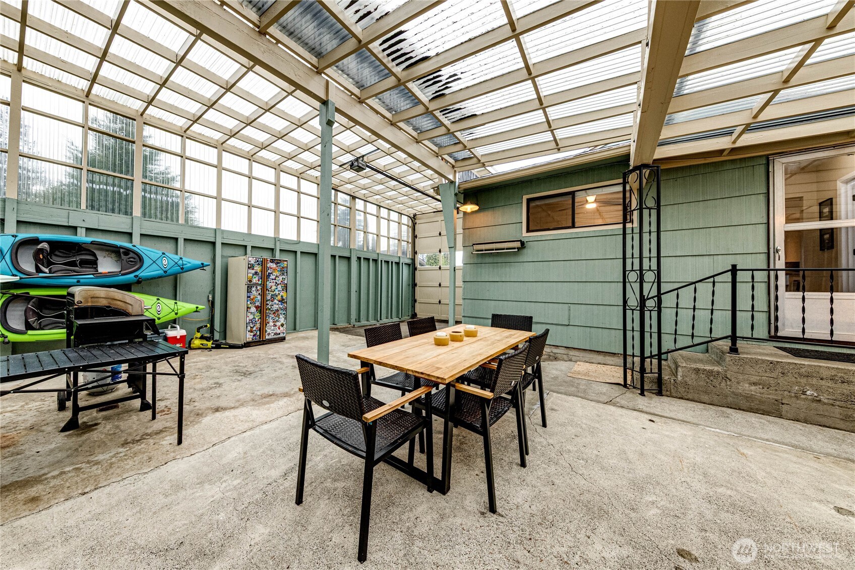 1922 West 7th Street Port Angeles, WA 98363 - Photo 28 of 40 a backyard of a house with table and chairs
