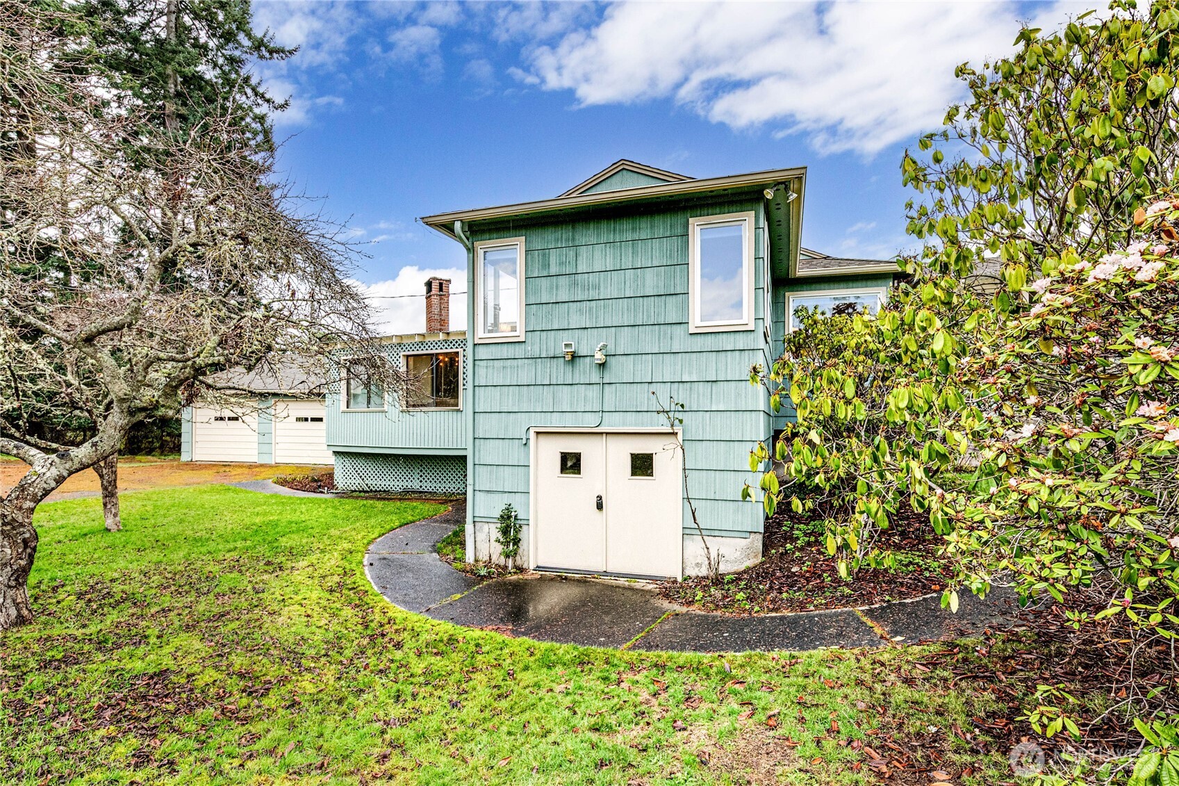 1922 West 7th Street Port Angeles, WA 98363 - Photo 31 of 40 a view of a house with a yard