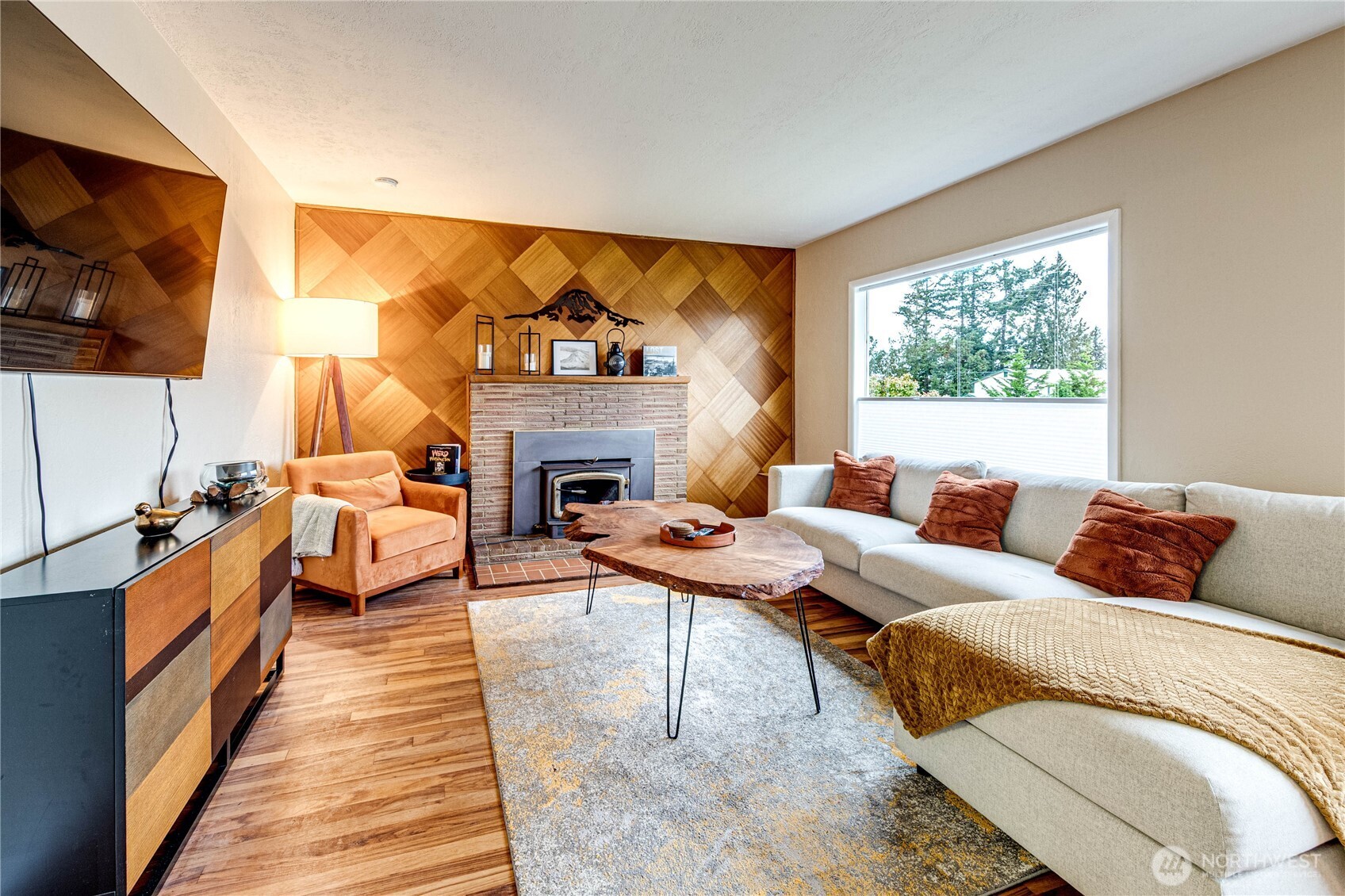 1922 West 7th Street Port Angeles, WA 98363 - Photo 5 of 40 a living room with furniture a rug and a fireplace