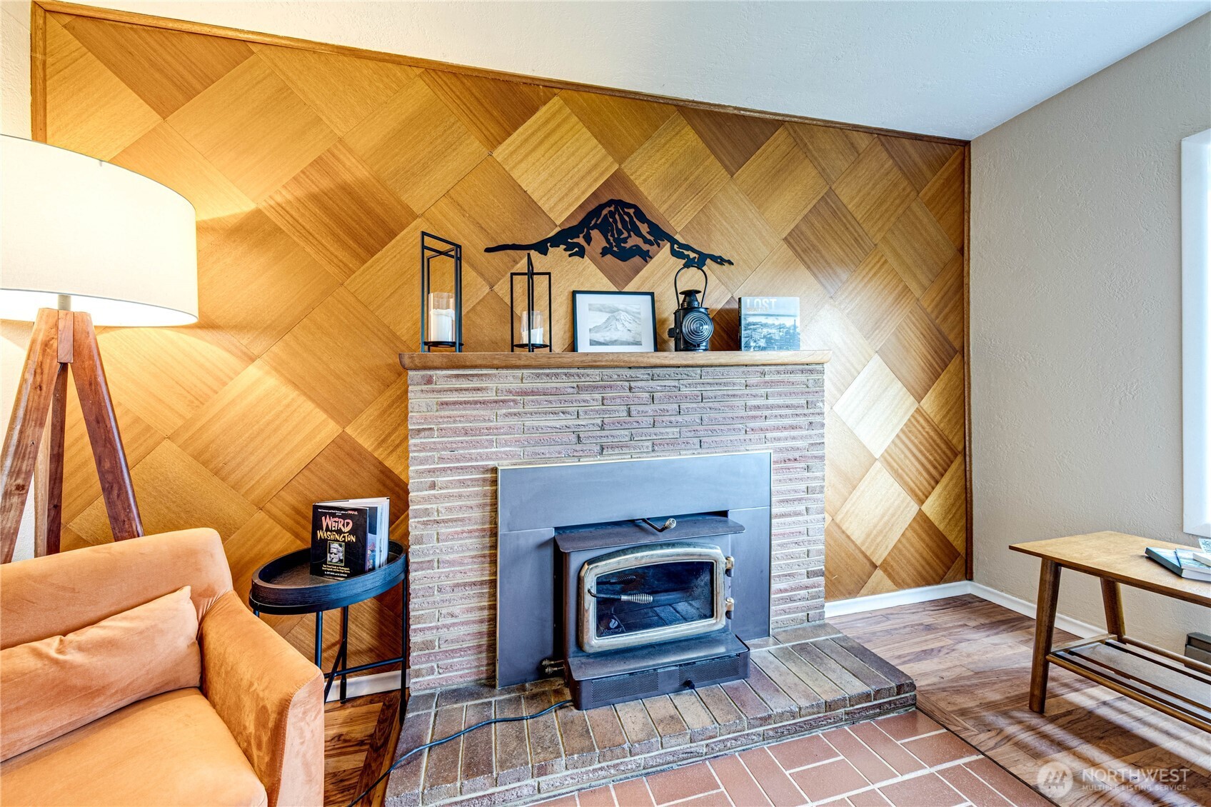 1922 West 7th Street Port Angeles, WA 98363 - Photo 6 of 40 a living room with a couch and a fireplace
