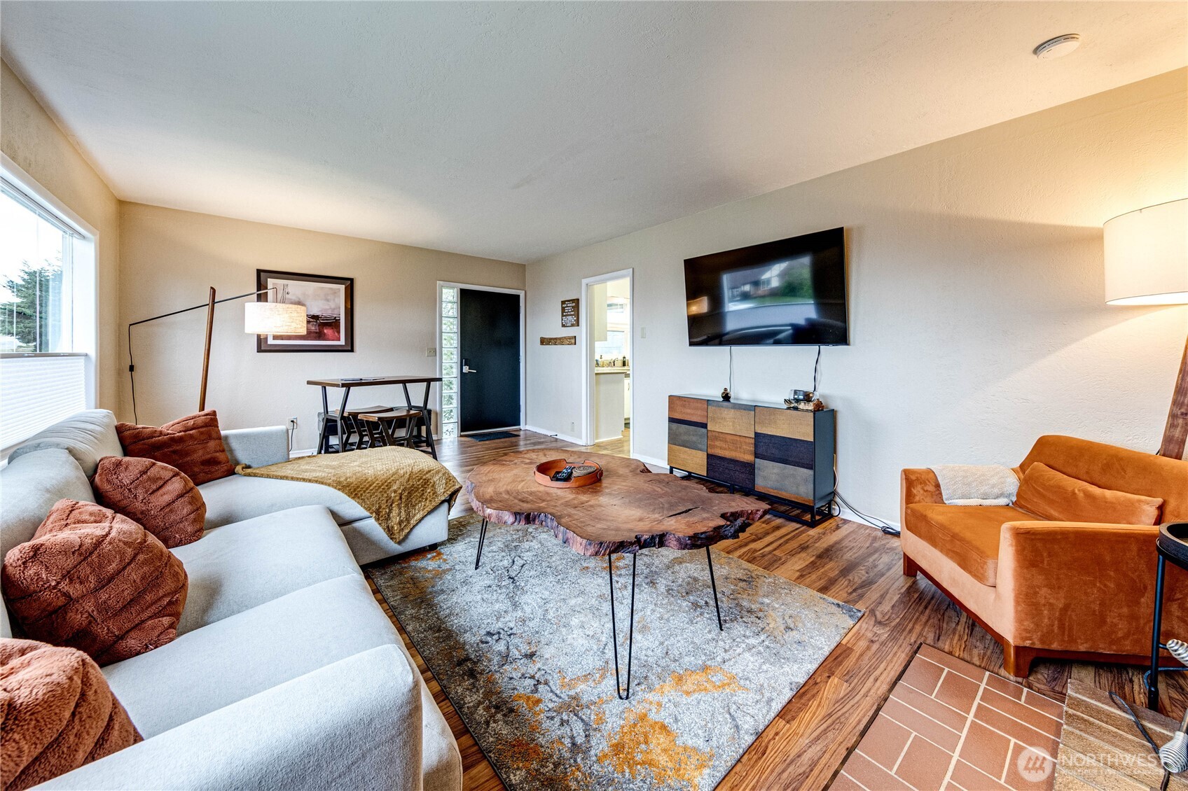 1922 West 7th Street Port Angeles, WA 98363 - Photo 8 of 40 a living room with furniture and a flat screen tv