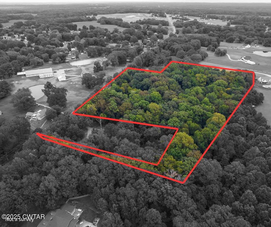 0 Us-412 Jackson, TN 38305 - Photo 5 of 9 an aerial view of a houses