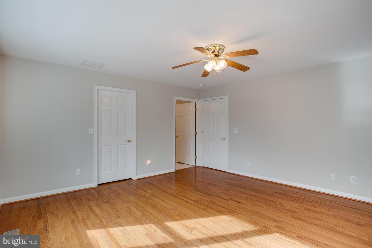 3333 Thomas Point Road Annapolis, MD 21403 - Photo 14 of 30 Master Bedroom with Walk-in Closet