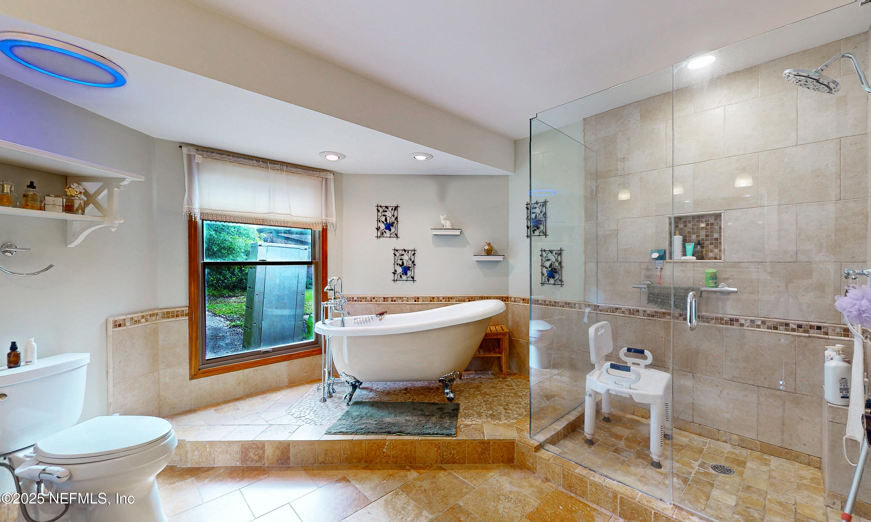 2860 Ravines Road Middleburg, FL 32068 - Photo 21 of 52 a very nice looking dining room with a chair and a large window