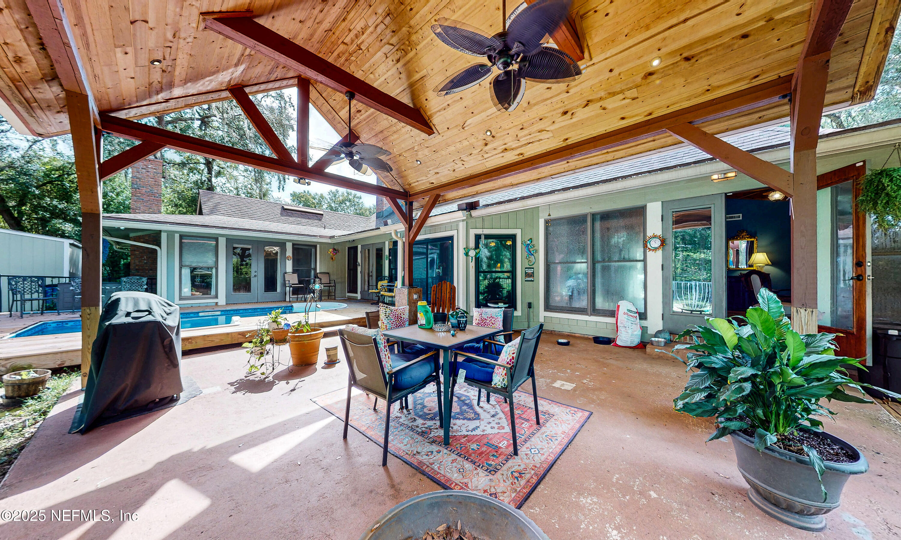 2860 Ravines Road Middleburg, FL 32068 - Photo 34 of 52 a house view with a seating space and garden space