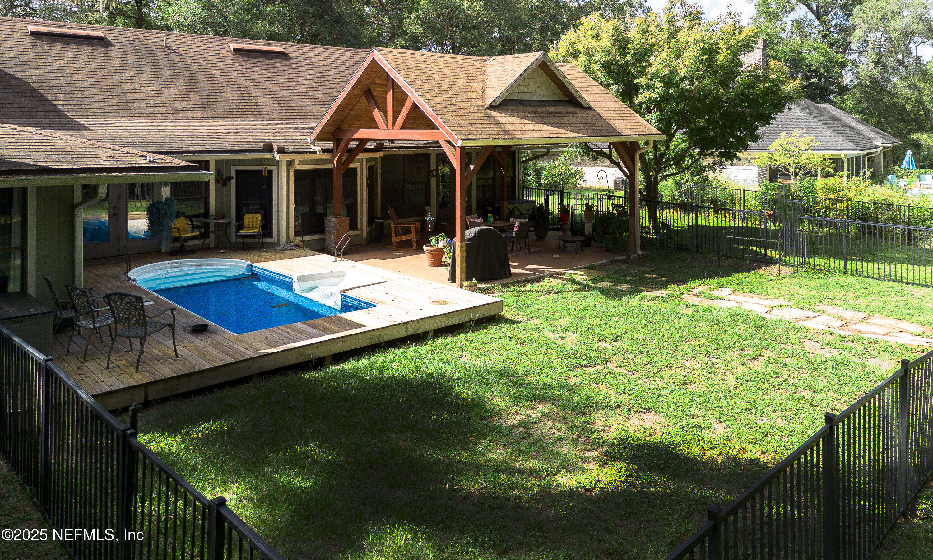 2860 Ravines Road Middleburg, FL 32068 - Photo 36 of 52 a view of house with backyard outdoor seating and green space