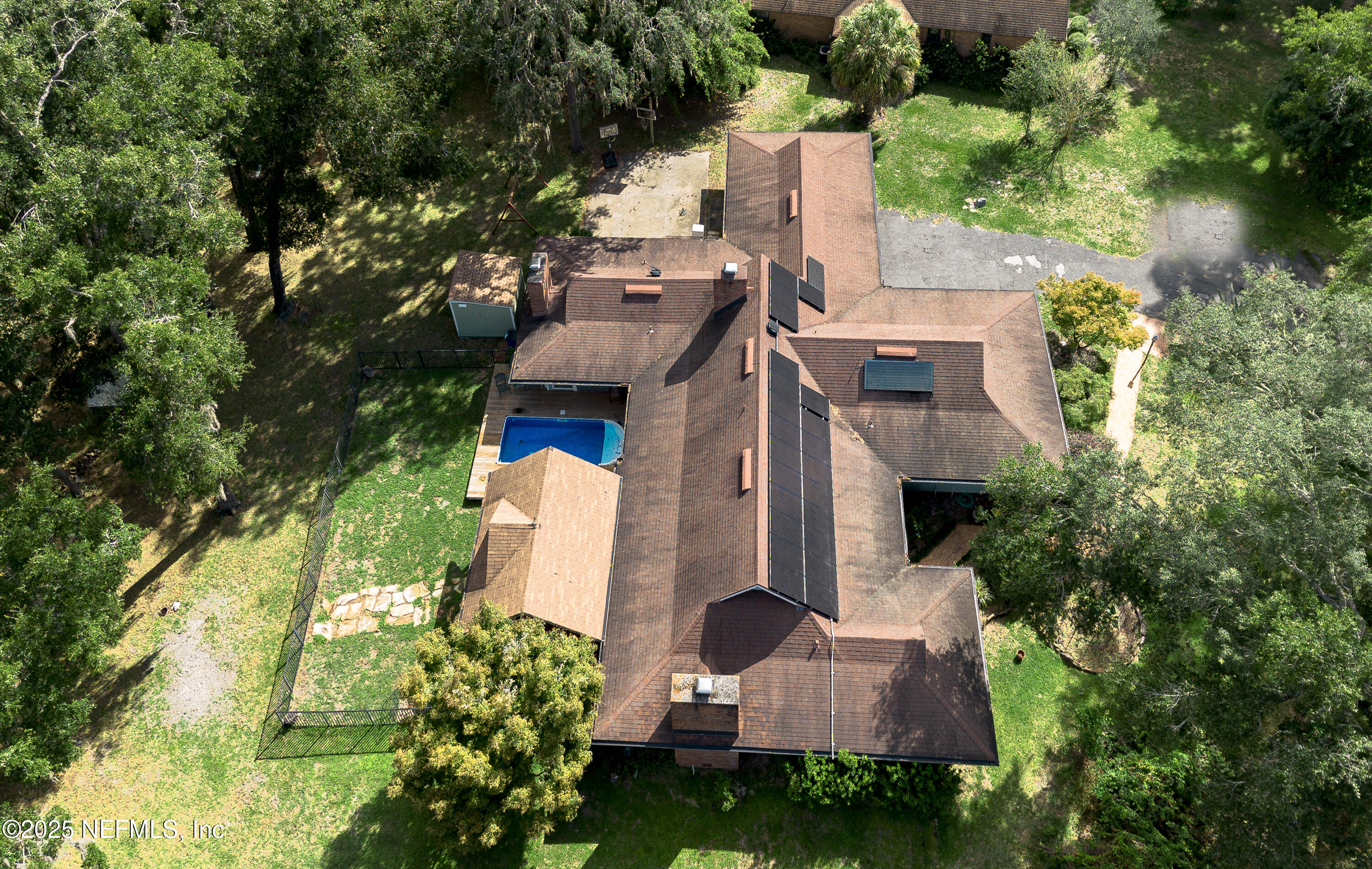 2860 Ravines Road Middleburg, FL 32068 - Photo 38 of 52 an aerial view of a house with a yard and garden