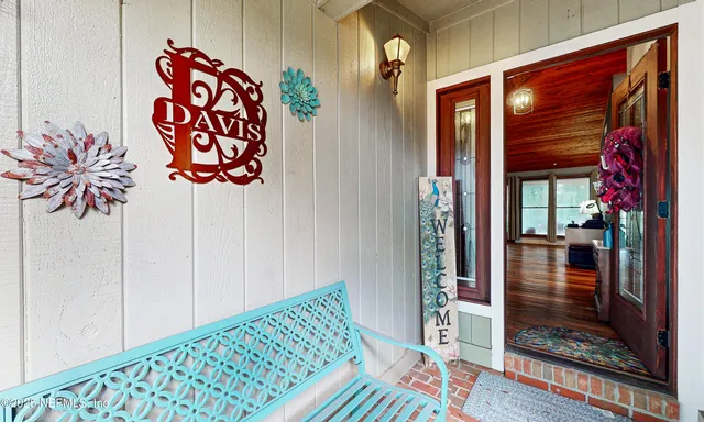 a view of an entryway with a rug