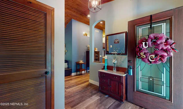 a view of living room and kitchen with furniture