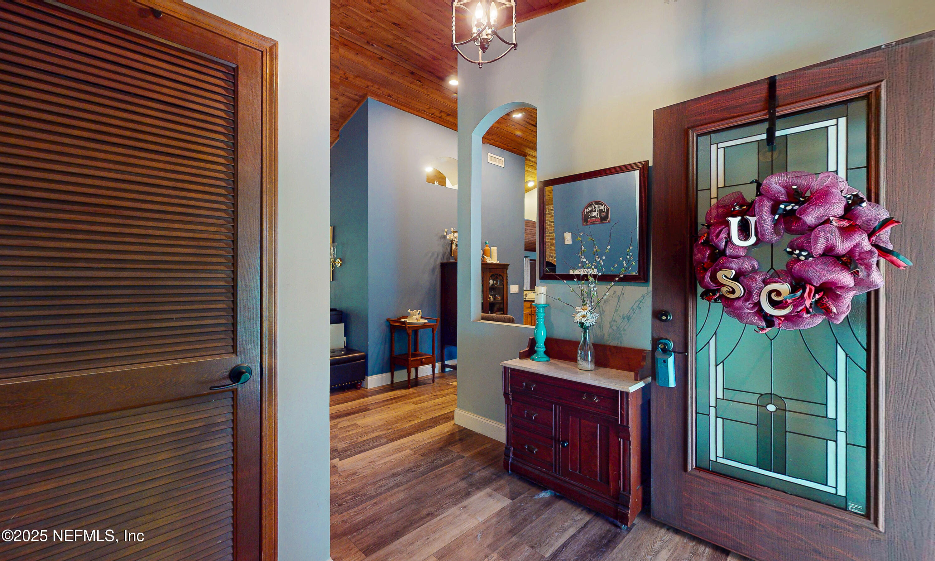 2860 Ravines Road Middleburg, FL 32068 - Photo 5 of 52 a view of living room and kitchen with furniture