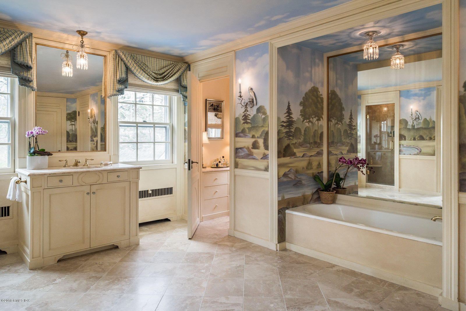 32 Pecksland Road Greenwich, CT 06831 - Photo 12 of 24 a bathroom with a tub sink shower and mirror