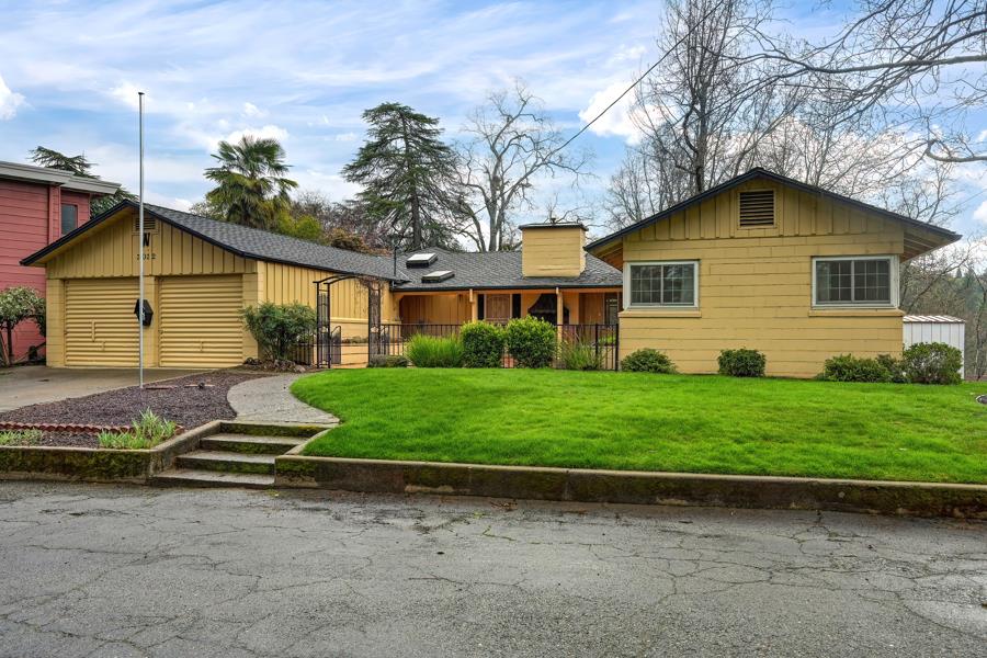 3032 Lewis Street Placerville, CA 95667 - Photo 1 of 1 a view of a house with a yard and large tree