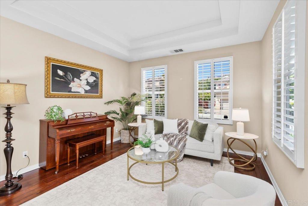 838 Luminara Way San Marcos, CA 92078 - Photo 18 of 54 a living room with furniture and a large window