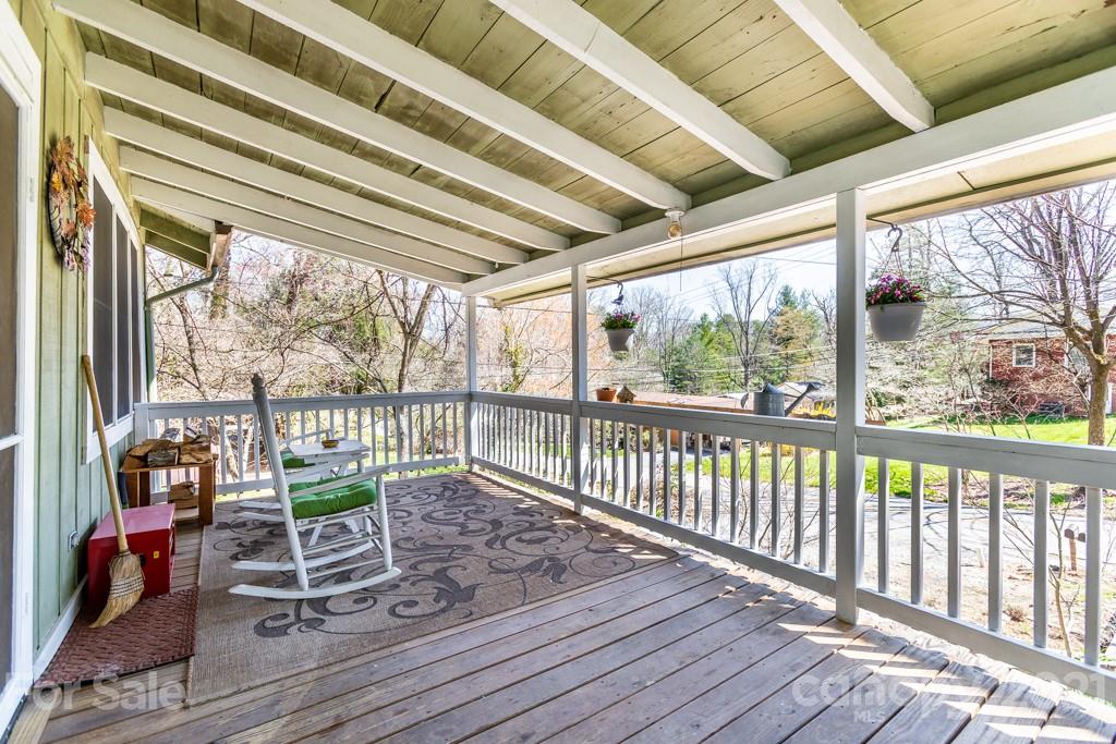 741 County Road Waynesville, NC 28785 - Photo 11 of 42 a view of a two chairs in the balcony