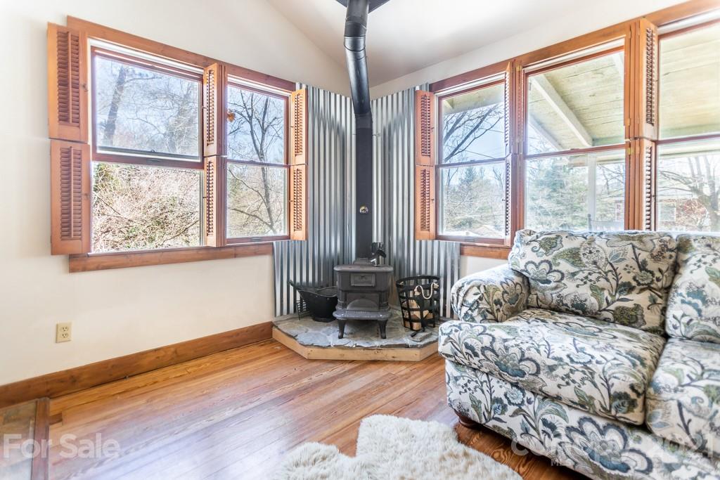 741 County Road Waynesville, NC 28785 - Photo 14 of 42 a living room with furniture and a large window