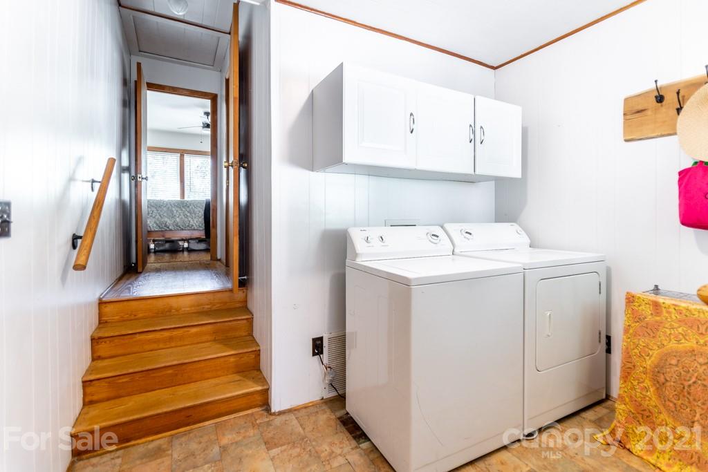 741 County Road Waynesville, NC 28785 - Photo 24 of 42 a utility room with dryer and washer