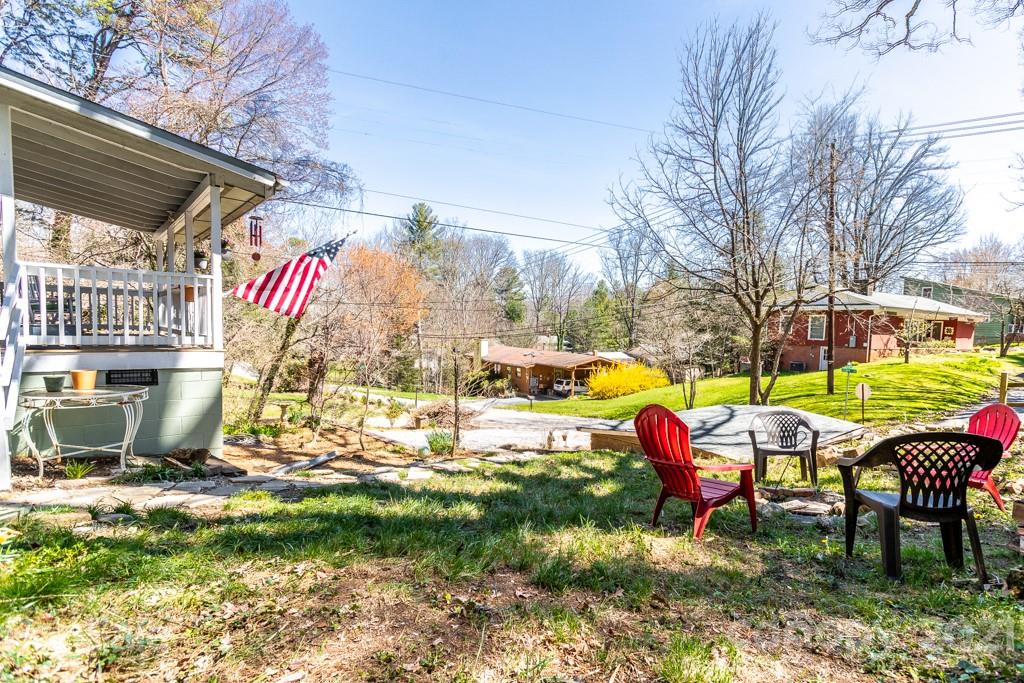 741 County Road Waynesville, NC 28785 - Photo 26 of 42 a view of yard with seating area
