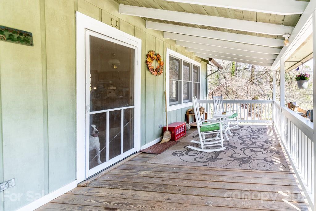 741 County Road Waynesville, NC 28785 - Photo 29 of 42 a view of a room with wooden floor and furniture