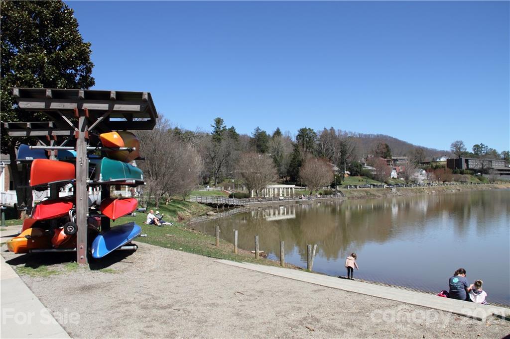 741 County Road Waynesville, NC 28785 - Photo 34 of 42 a view of a lake with a car parked