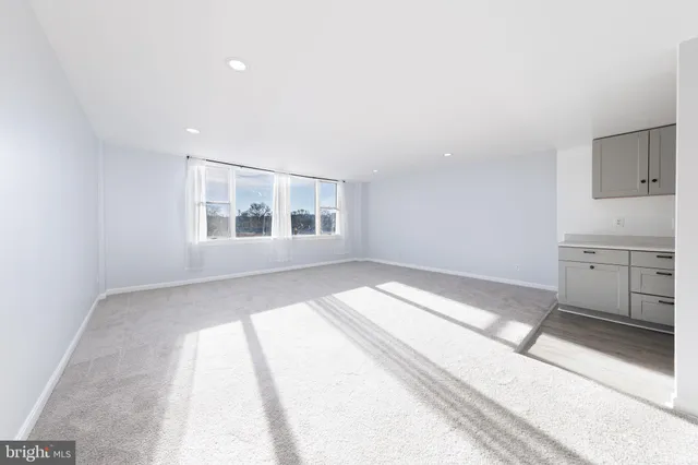 an empty room with windows