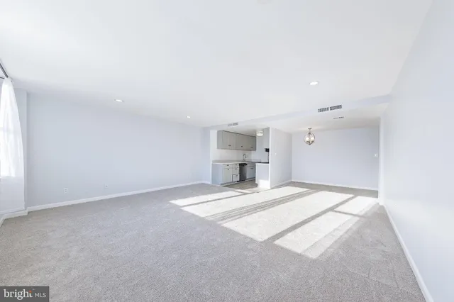 a view of room with hardwood floor