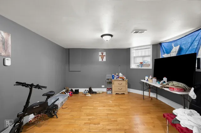 a room with furniture and a flat screen tv