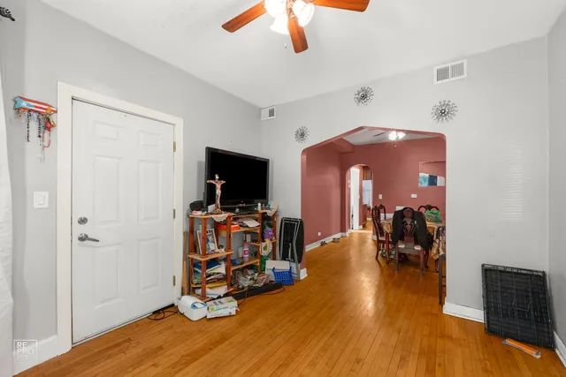 a view of a livingroom with furniture and a flat screen tv
