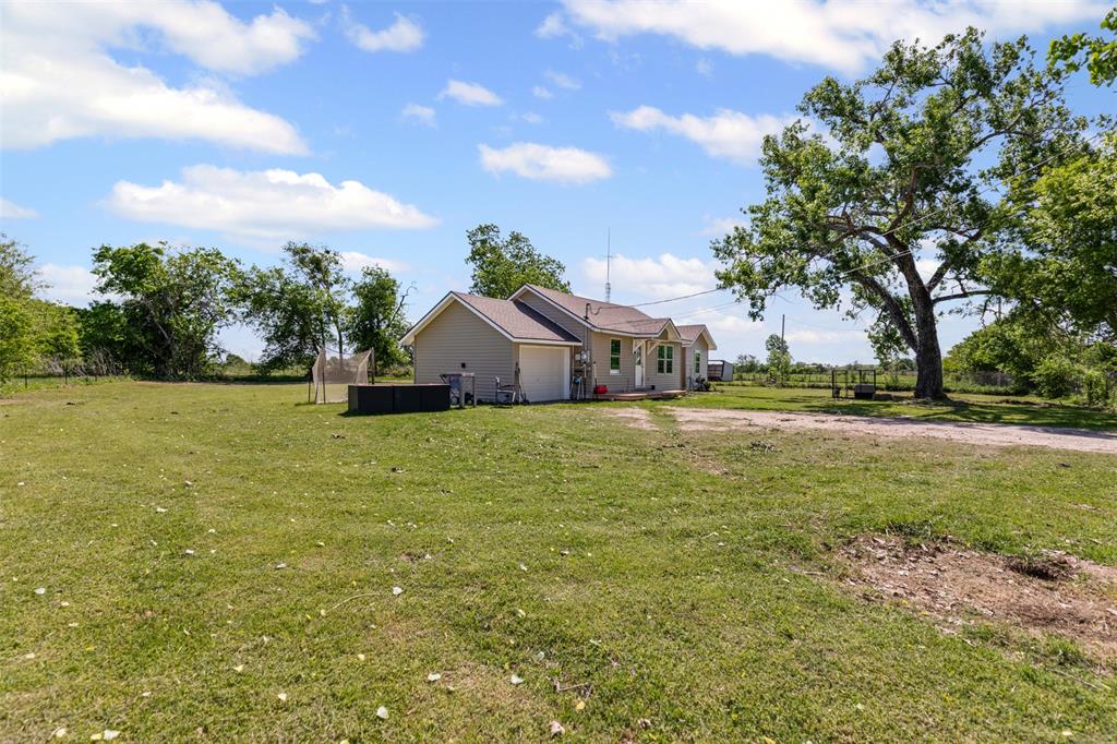 105 South Lavaca Street Whitney, TX 76692 - Photo 2 of 40 a front view of a house with garden