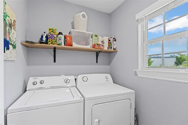 a utility room with dryer and washer