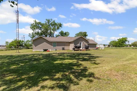 a front view of house with garden