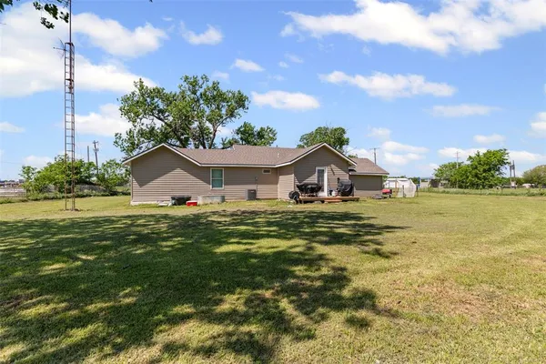 a front view of house with garden