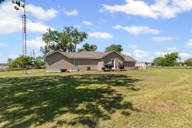 a front view of house with garden